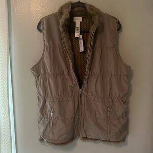 Brand new Chico’s knit back, fake fur lined vest. Size 2 in chicos size